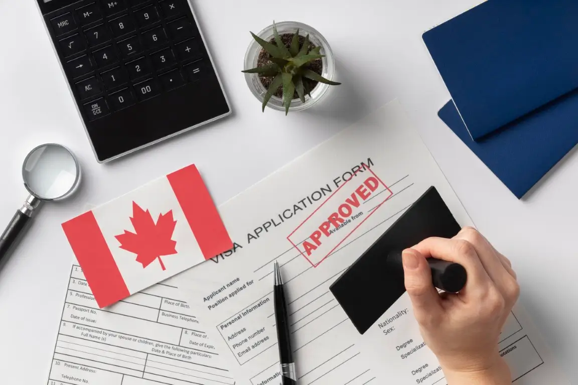 visa-application-composition-with-canadian-flag (Medium)